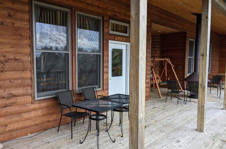 Deck entrance with seating.