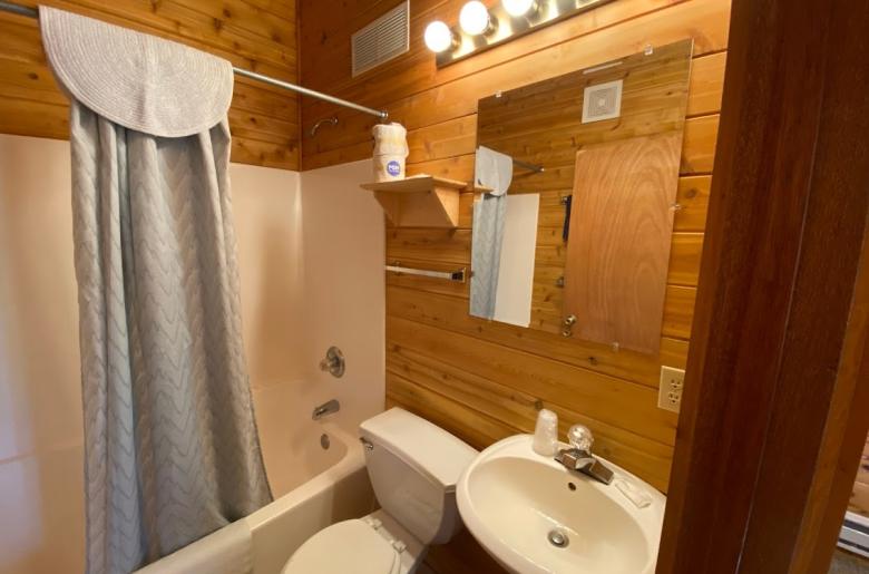 Master bathroom with a standard tub/shower.