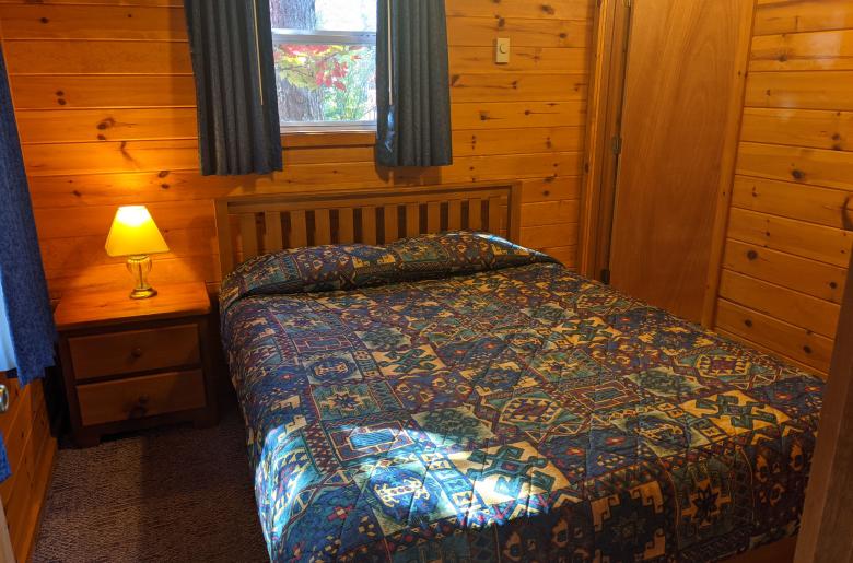 Bedroom with a queen bed and ensuite bathroom. 