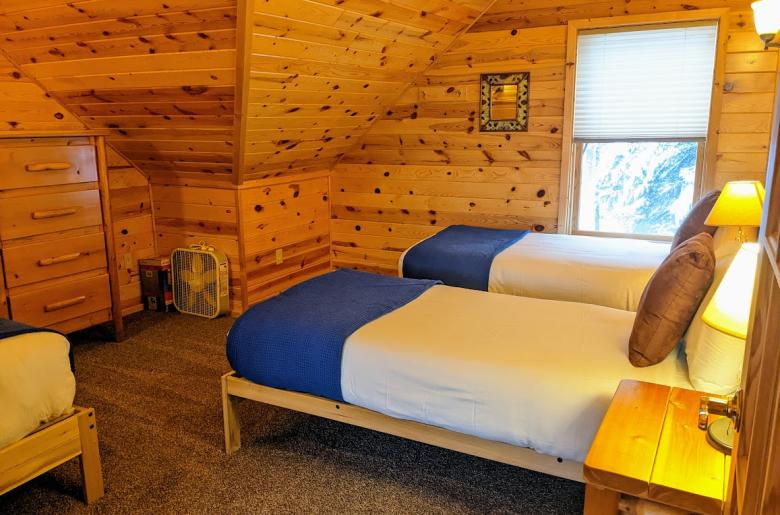 Upstairs bedroom with two XL twins and one regular twin.