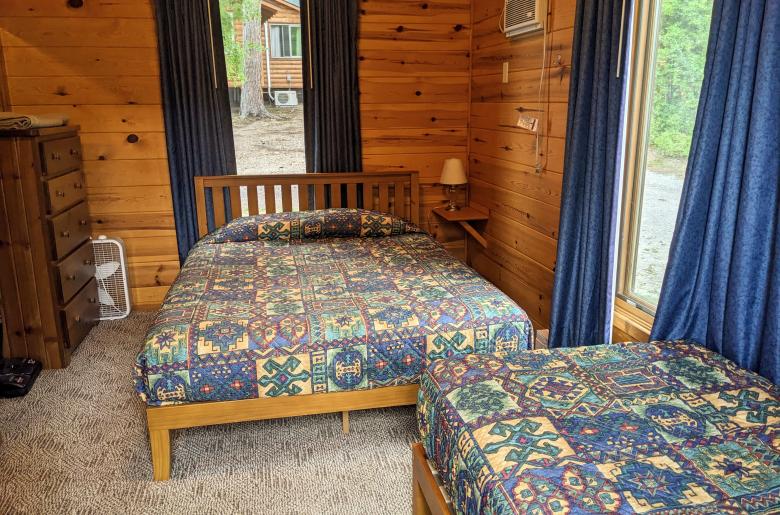 Bedroom with a queen and twin bed.