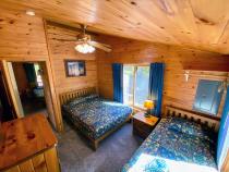 Bedroom with a queen and twin bed.