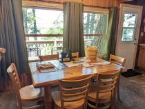 Dining room with seating for 6 and views of the lake.